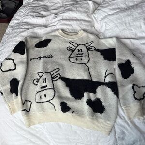 Oversized, cozy black and white cow sweater